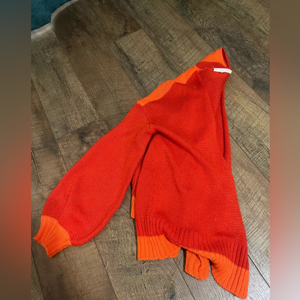 red and orange cardigan